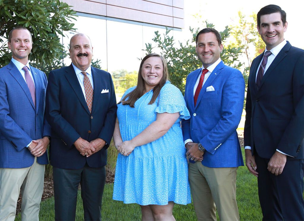 McDonalds - Photo of McDonalds Insurance Team Outdoors in Blue